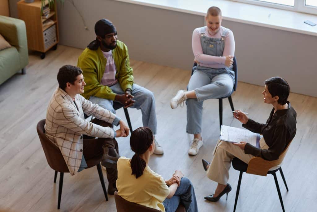 Supportive discussion about rehab options and the recovery journey with a loved one