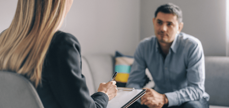 Therapy session with counselor and patient - Ecstasy Treatment