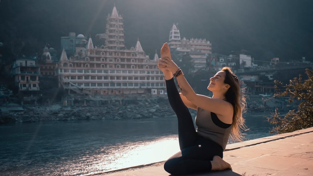 a person practicing yoga in a peaceful setting - Drug Detox